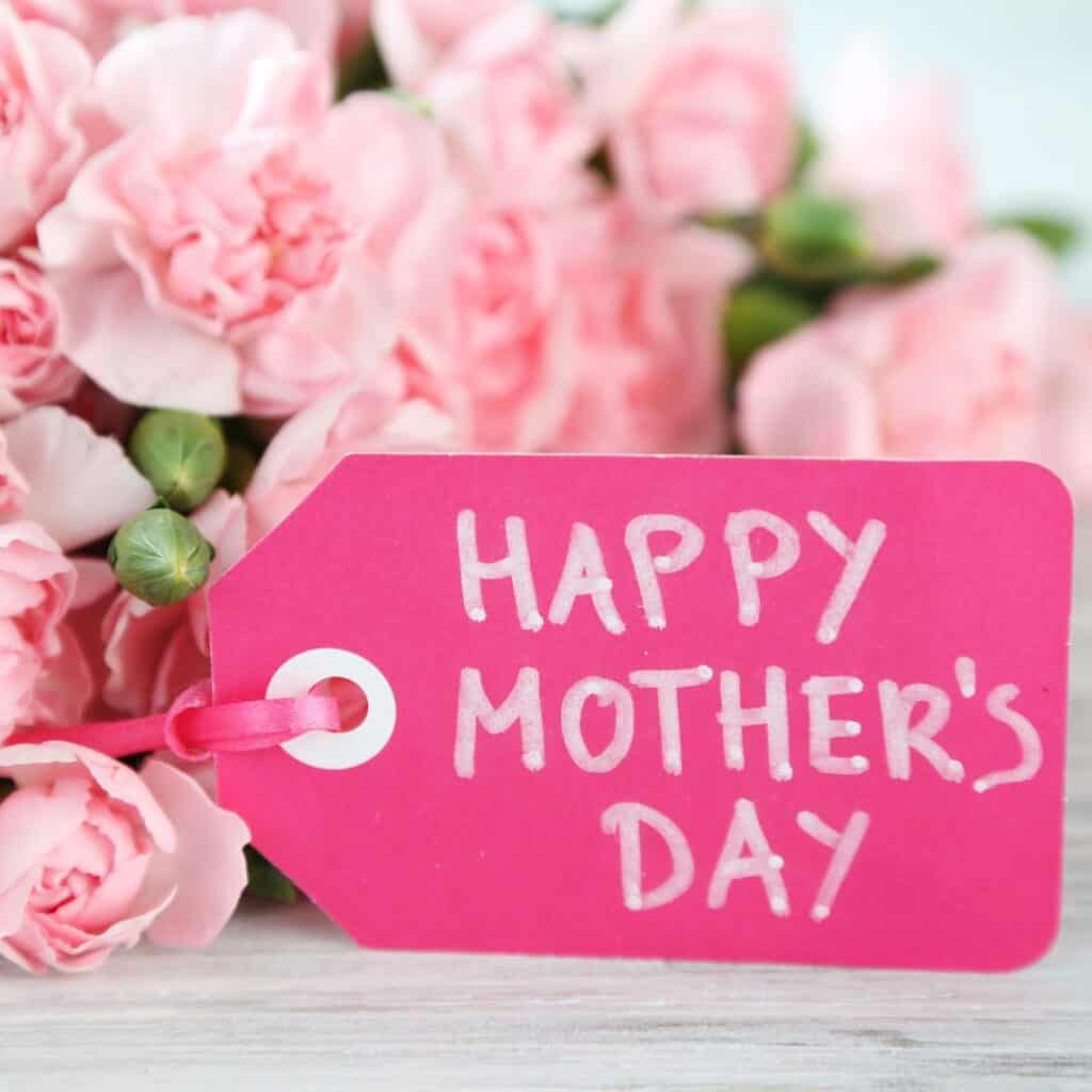 pink carnations with happy mother's day tag