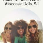 Pin with image of three female friends propping themselves up on their elbows and smiling at the camera, text above image reads 'USA: Guide to adult fun in Wisconsin Dells, WI'