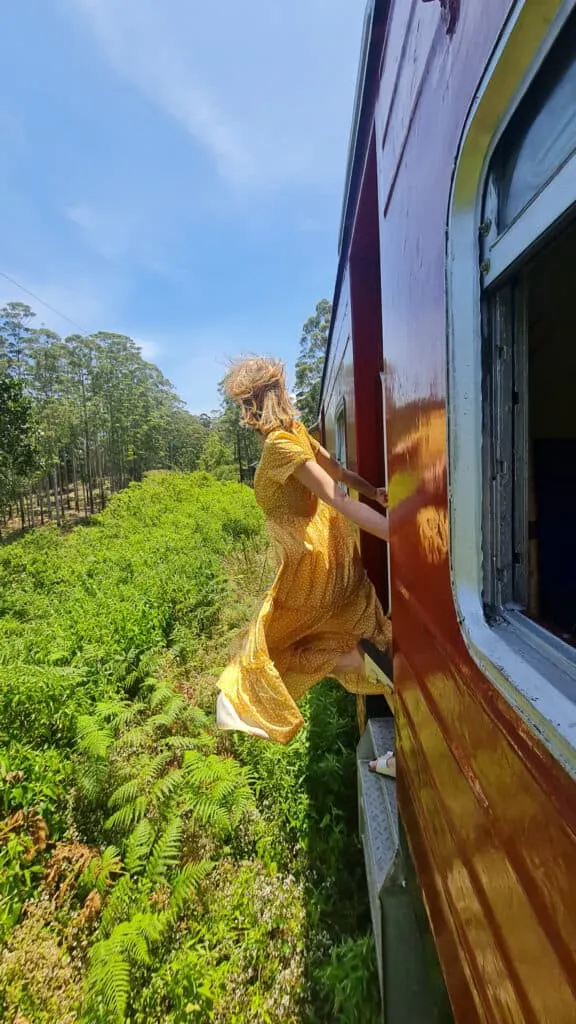 girl taking train to ella, sri lanka