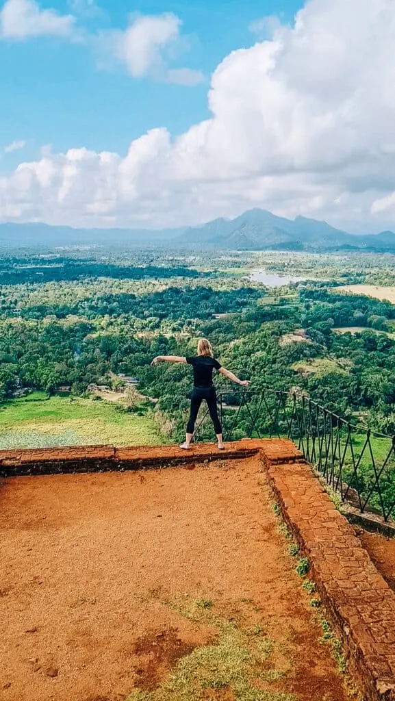 lion's rock sri lanka, girl walking on the edge