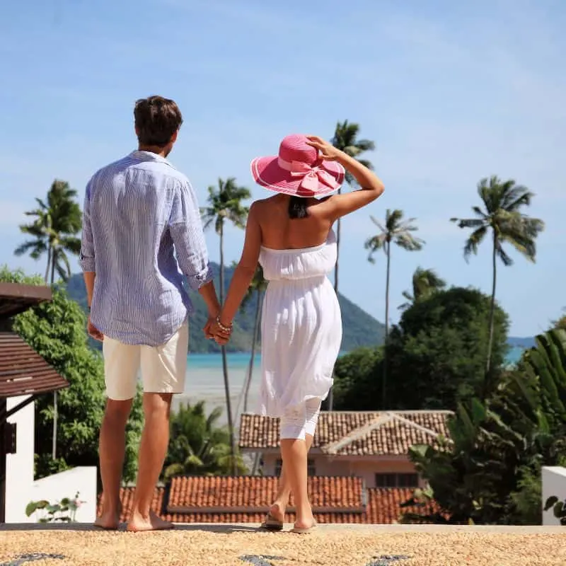 couple holding hands at a resorts in Wisconsin for couples