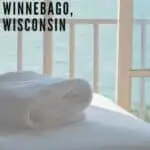a pin with a towel on a bed at one of the best resorts on Lake Winnebago, Wisconsin