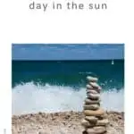 Pin with image of pebbley beachfront with stacked pebbles in front of a small white crashing wave, text above image reads: best door county beaches for a fund day in the sun
