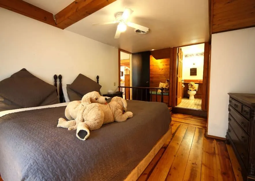 a cozy bedroom at Eleven Gables Inn and Cottage Lake Geneva - 10 Best Pet-Friendly Hotels in Lake Geneva, Wisconsin