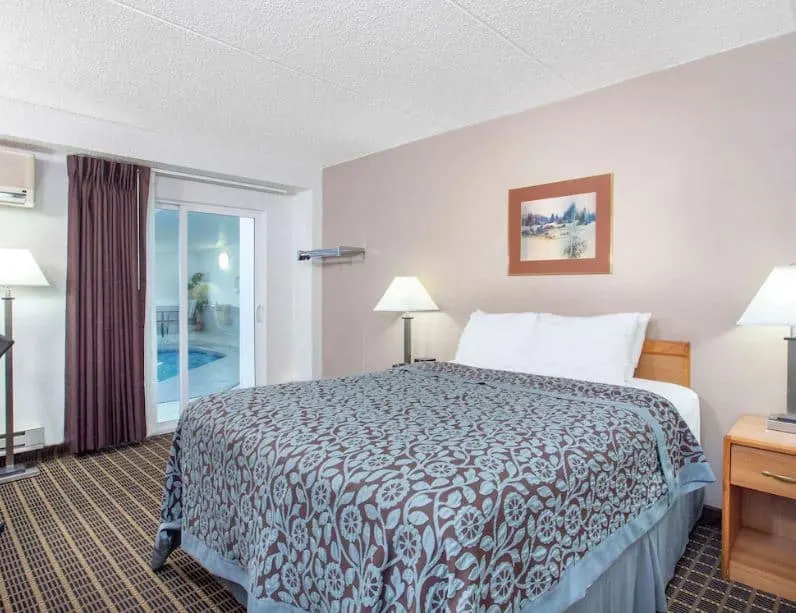 bedroom with a comfy bed at Days Inn by Wyndham Fond du Lac Wisconsin - 12 Best Resorts on Lake Winnebago, Wisconsin