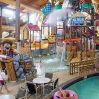 indoor pools and entertainment areas with kids having fun at indoor Water parks in Wisconsin Dells