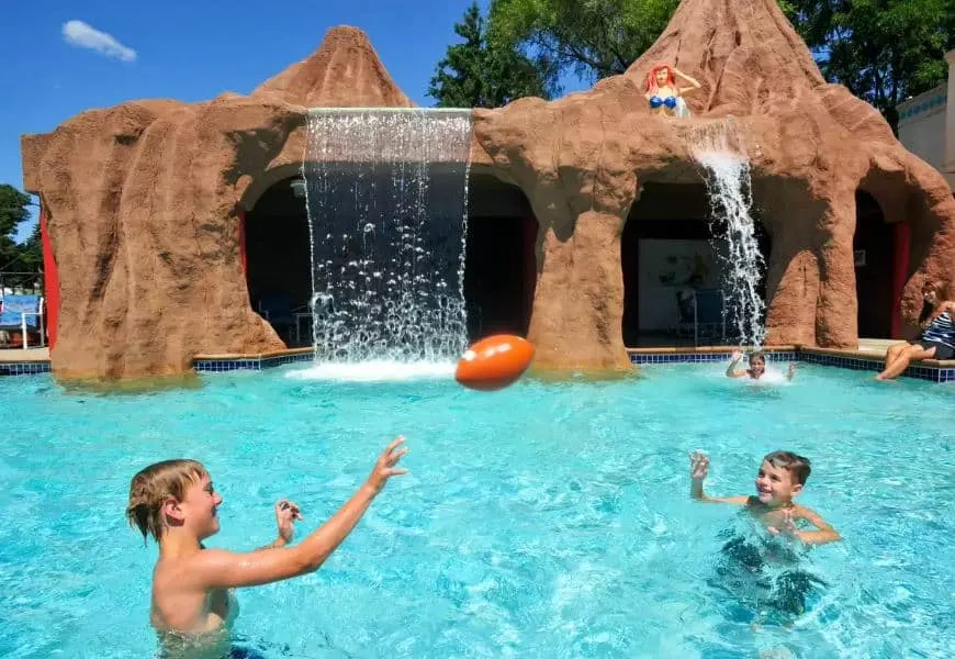 kids playing in a pool at one of the best hotels in Wisconsin