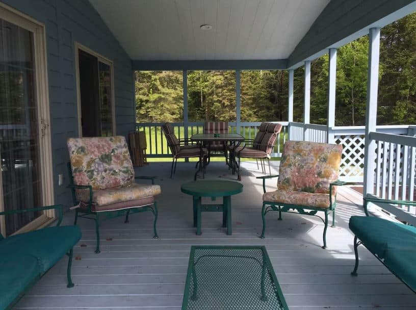 porch with dining area at Mary Anns Apostle Island Wisconsin - 14 Unique Airbnbs in Apostle Islands