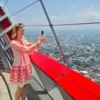 travel blogger using phone during traveling