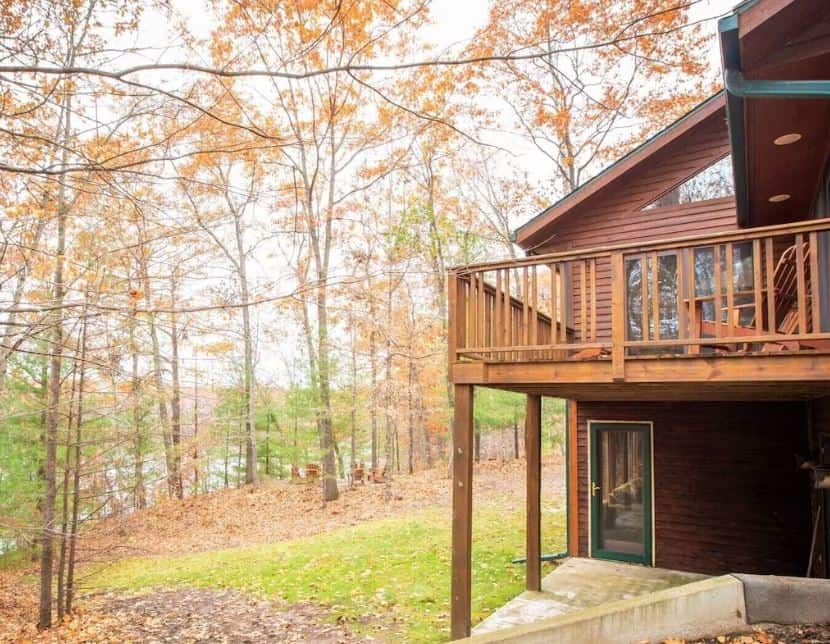 view with the lake from The Lodge Wooded Retreat in Comstock Wisconsin - 13 Best Lake Cabins in Wisconsin