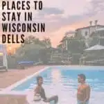 a pin with a couple in a pool at one of the most romantic places to stay in wisconsin dells