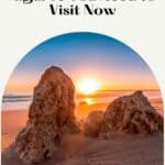 Pin with image of some freestanding rocks resting on a golden sandy beach with the setting sun and small coastal waves visible between them, caption reads: Best Plaves in Algarve You Need to Visit Now by Paulinaontheroad.com