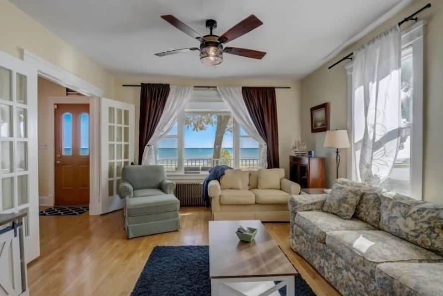 living room with sofas and lake view at the Family house on the lake racine wisconsin - 15 Best Airbnbs in Racine, Wisconsin