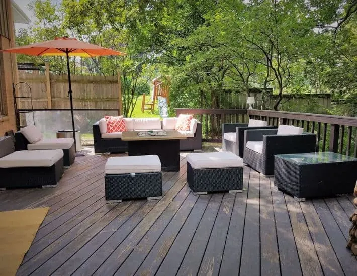 secluded patio with garden furniture at the Wisconsin Treehouse Getaway racine - 15 Best Airbnbs in Racine, Wisconsin