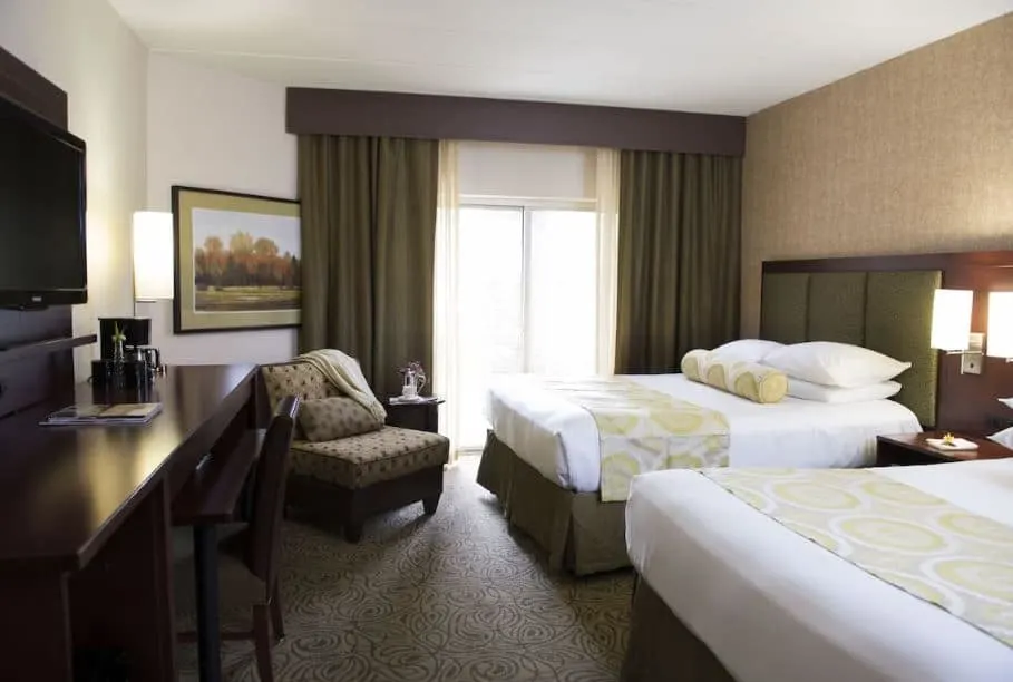 cozy room with 2 separate beds, a desk and TV at Ho-Chunk Casino Hotel and Convention Center, Wisconsin Dells