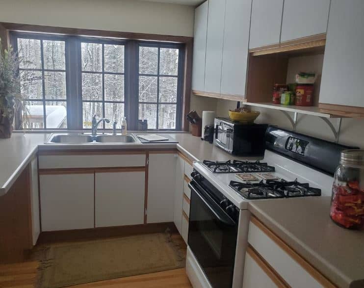 equipped kitchen with view to the garden at Lovely downtown house, Wausau, Wisconsin