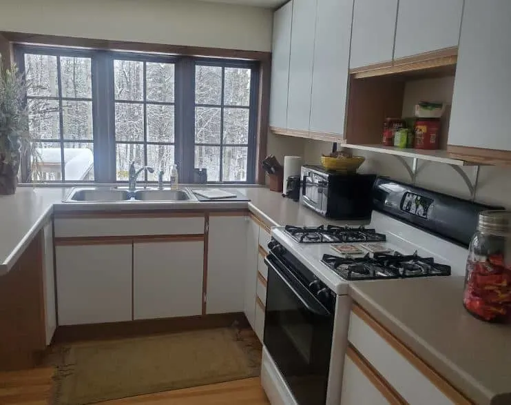 equipped kitchen with view to the garden at Lovely downtown house, Wausau, Wisconsin
