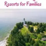 a pin with a Lighthouse at Lake Michigan, finding here the best lake michigan resorts for families.