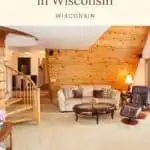 a pin wit the living room with sofa at one of the best log cabin rentals in Wisconsin