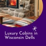a pin with a fire place in a living room at one of the best luxury cabins in Wisconsin Dells.