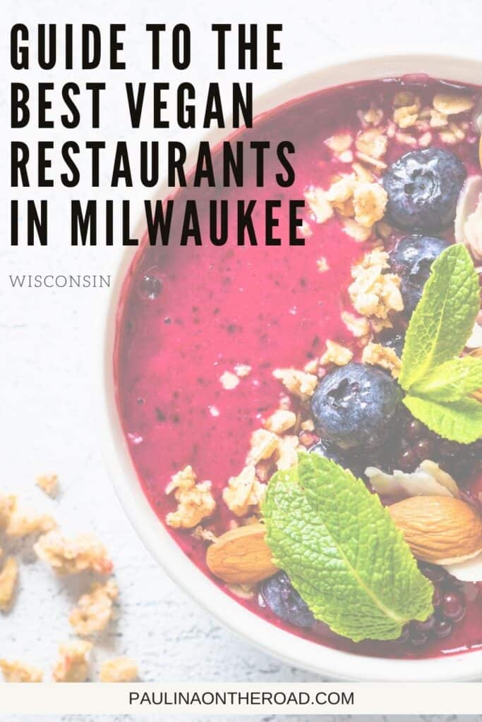 Pin with image of a vegan dessert bowl containing blueberries, almonds and mint leaves, caption reads: Guide to the Best Vegan Restaurants in Milwaukee Wisconsin from Paulinaontheroad.com