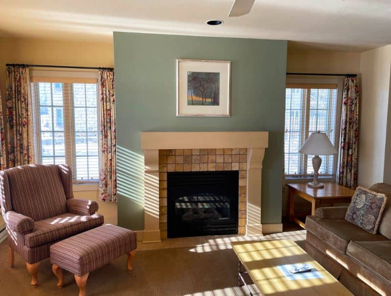fire place in the living room with cozy sofa at Stone Harbor Resort, Sturgeon Bay, Wisconsin