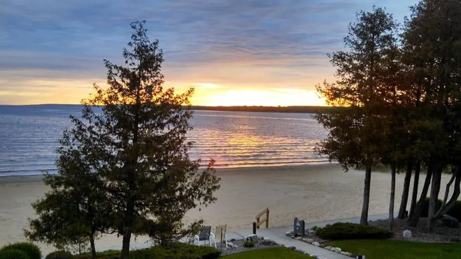 lake view at Sand Bay Beach Resort with sun setting in Sturgeon Bay, Wisconsin