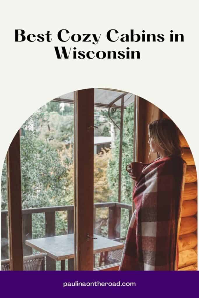 a pin with a girl having a cup of drink by the window at one of the best cozy cabins in Wisconsin. 
