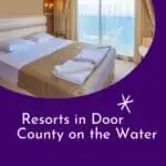 a pin with a bedroom with window overlooking a lake at one of the best resorts in Door County on the water.