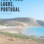 Pin with image of curved sandy beach sitting next to calm blue waters and surrounded by rolling grassy hills all under a clear azure blue sky, caption reads: Top Day Trips from Lagos, Portugal, The Algarve from paulinaontheroad.com