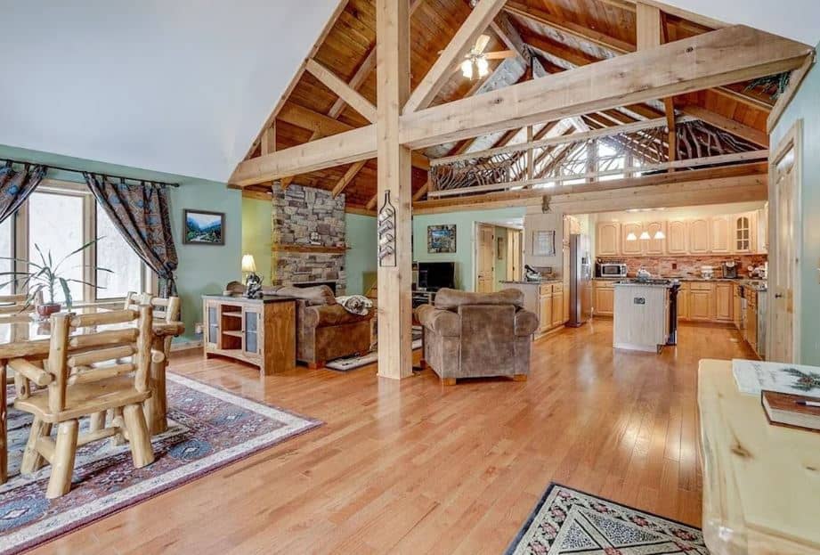 big wooden living room with sitting area at Beautiful Cottage on private land, Lake Geneva, Wisconsin