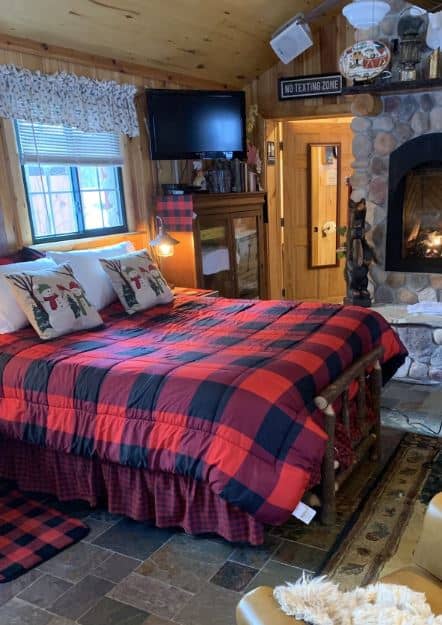 cozy bedroom with fire place Cozy cabin with a romantic gas fire place - Arbor Vitae, Wisconsin