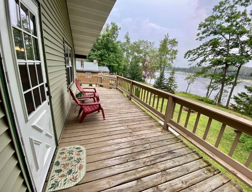 deck overlooking the lake at the peaceful getaway at one of the best Northwoods Wisconsin resort