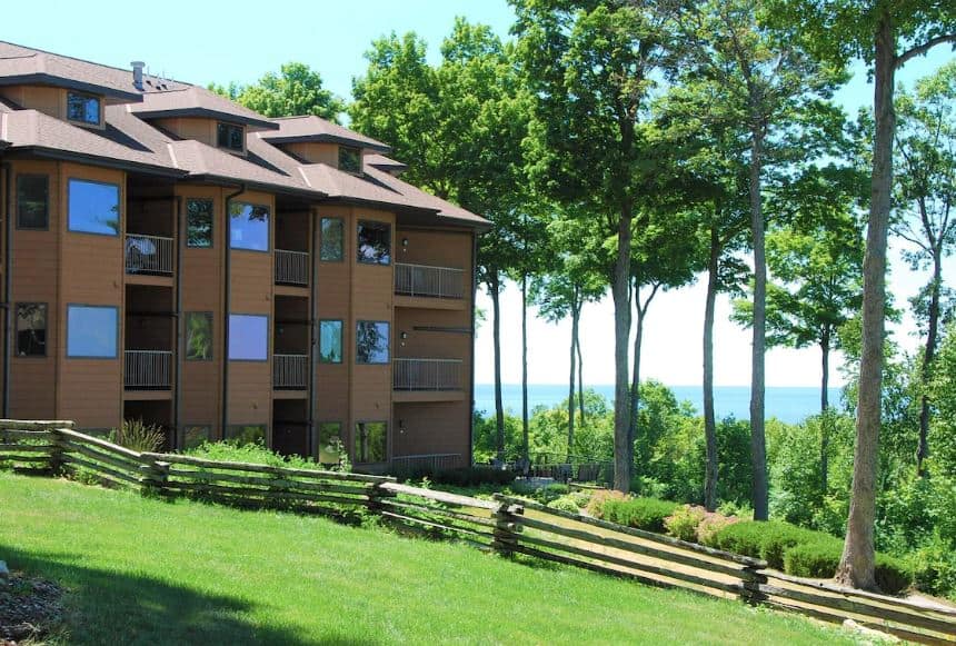 exterior of the Landmark Resort with lake view and surrounded by forest in Door County, Wisconsin