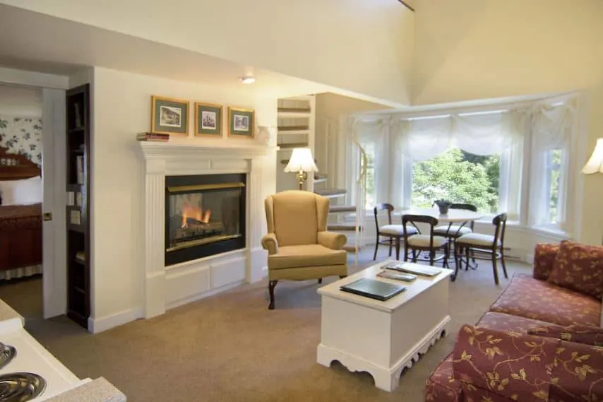 suite with fire place, sofa and kitchen at the Eagle Harbor Inn in Door County Wisconsin
