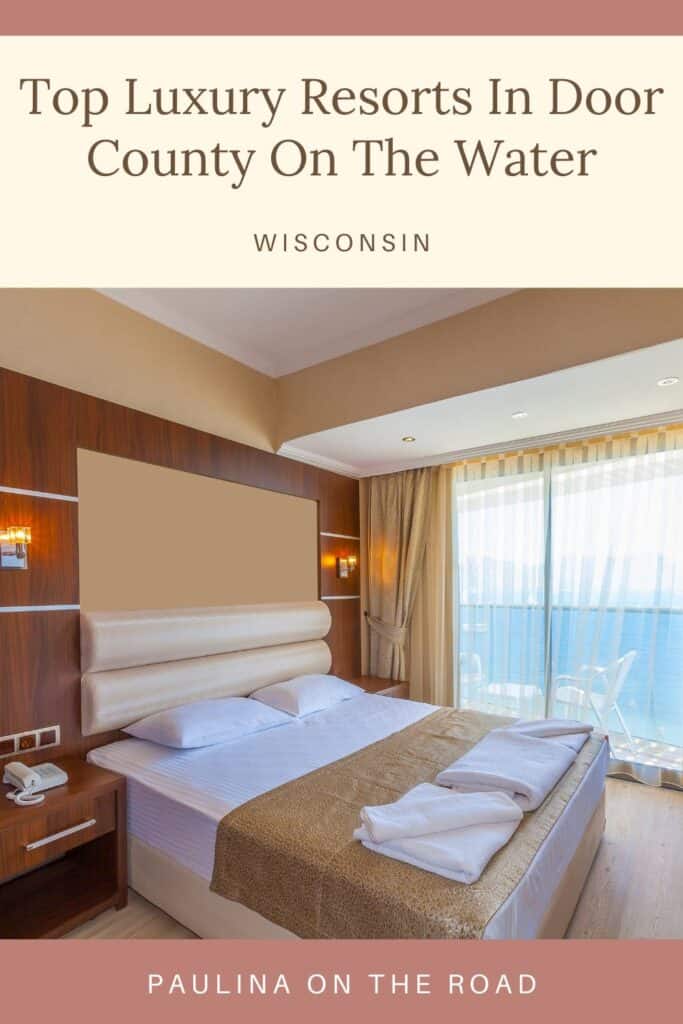 a pin with a bedroom overlooking a lake at one of the best Luxury Resorts In Door County On The Water 