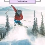a pin with a man jumping with his skis at one of the best Northern Wisconsin Ski Resorts