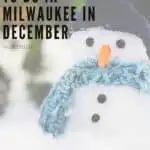Pin with image of a cute snowman complete with a carrot nose and dark buttons wearing a thick light blue scarf and a dark blue woolen hat, caption reads: Fun Things to Do in Milwaukee in December, Wisconsin from paulinaontheroad.com