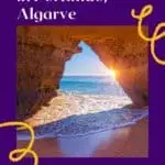 Pin with image of the sea seen through a gap in a large stone cave wall with the setting sun peeking through over the soft white surf of the waves, caption reads: What to do in Portimao, Algarve from Paulina on the Road