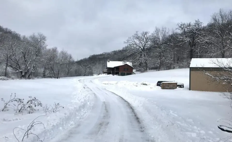 exterior of the driftless escape surrounded by snow in Wisconsin