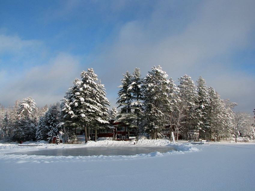 view from the outside of the Afterglow Lake Resort surrounded by snow in Northern Wisconsin