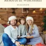 a pin with a family with a small kid dressed for Christmas at one of ht best family cabin resorts in Wisconsin.