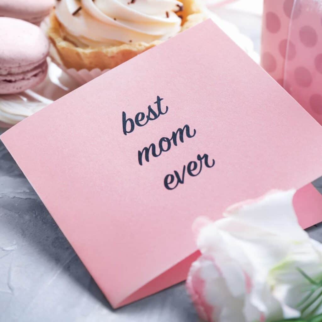 a pink card with a saying "best mom ever"