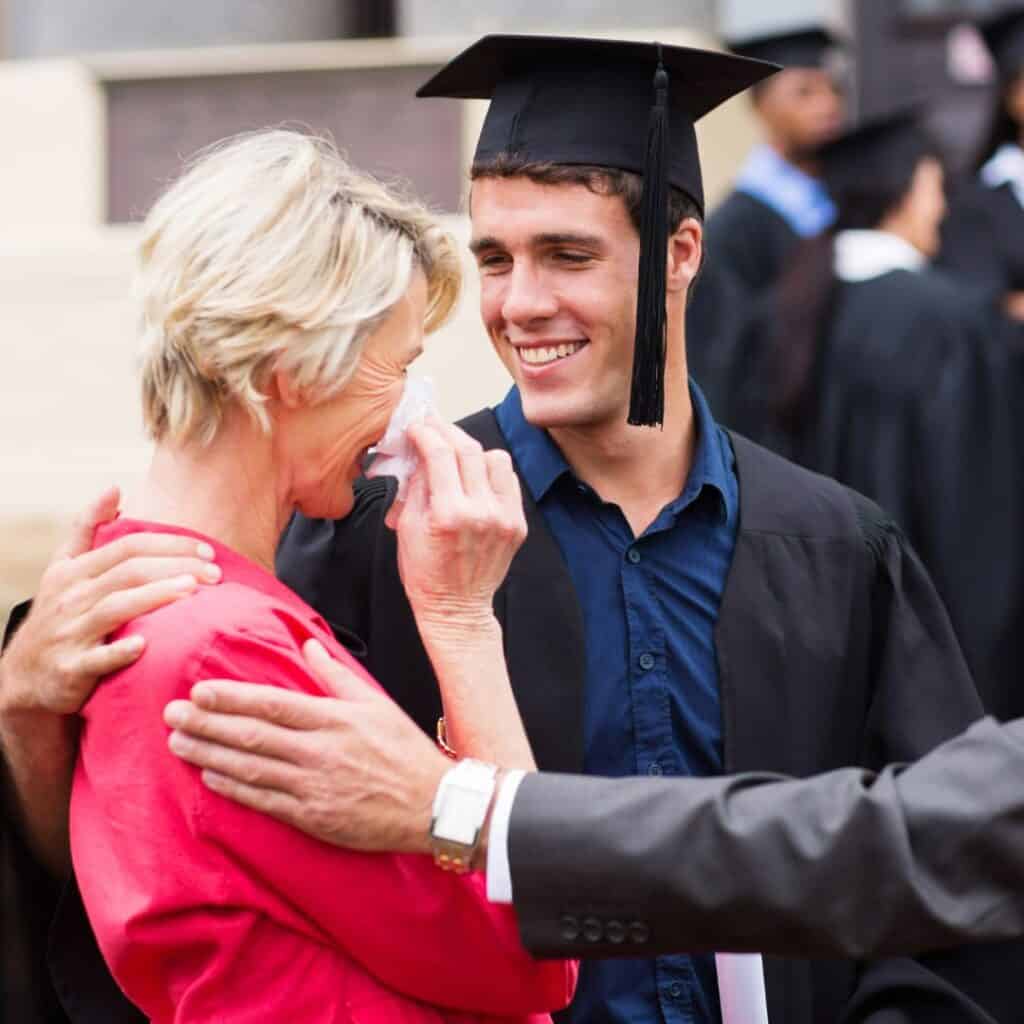 a mother crying after her son has graduated