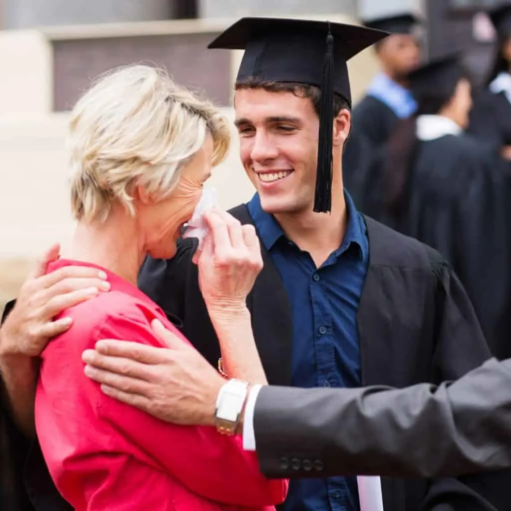 a mother crying after her son has graduated