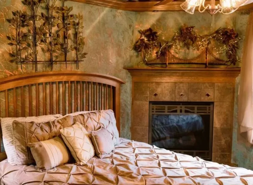 bedroom with fireplace at Martini Suite, A block from Lake Geneva and downtown, Wisconsin