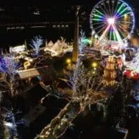 Christmas Market in Luxembourg City drone shot with Christmas lights and a lighted ferris wheel