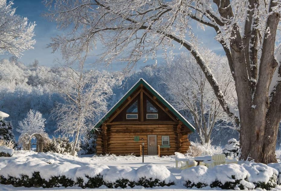 exterior of a cabin surrounded by snow at the Justin Trails Resort in Wisconsin