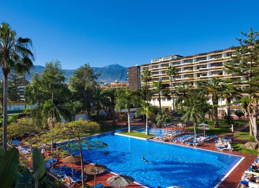 garden with pool and sun lounges at BLUESEA Puerto Resort in Puerto de la Cruz, Tenerife