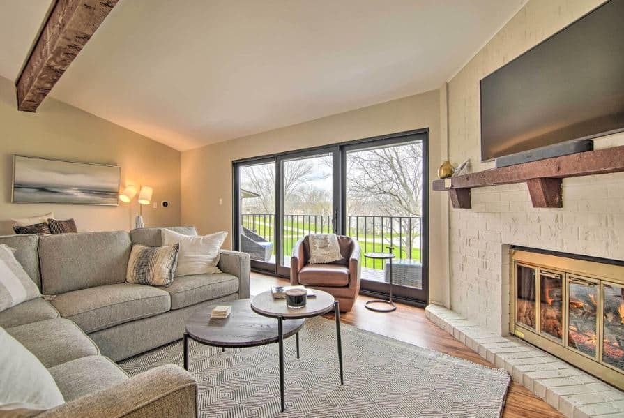 living room with fire place and view at Cozy Lake Geneva retreat with year-round views, Wisconsin